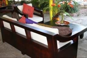 iaf-back-view-of-jamaican-living-room-cedar-cross-7ft-sofa-with-duck-fabric-cushions